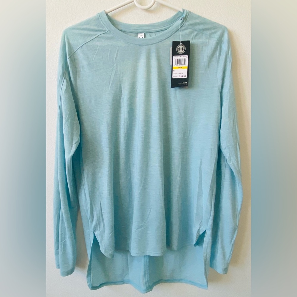 Under Armour women's athletic shirt featuring a distinct back cutout design M